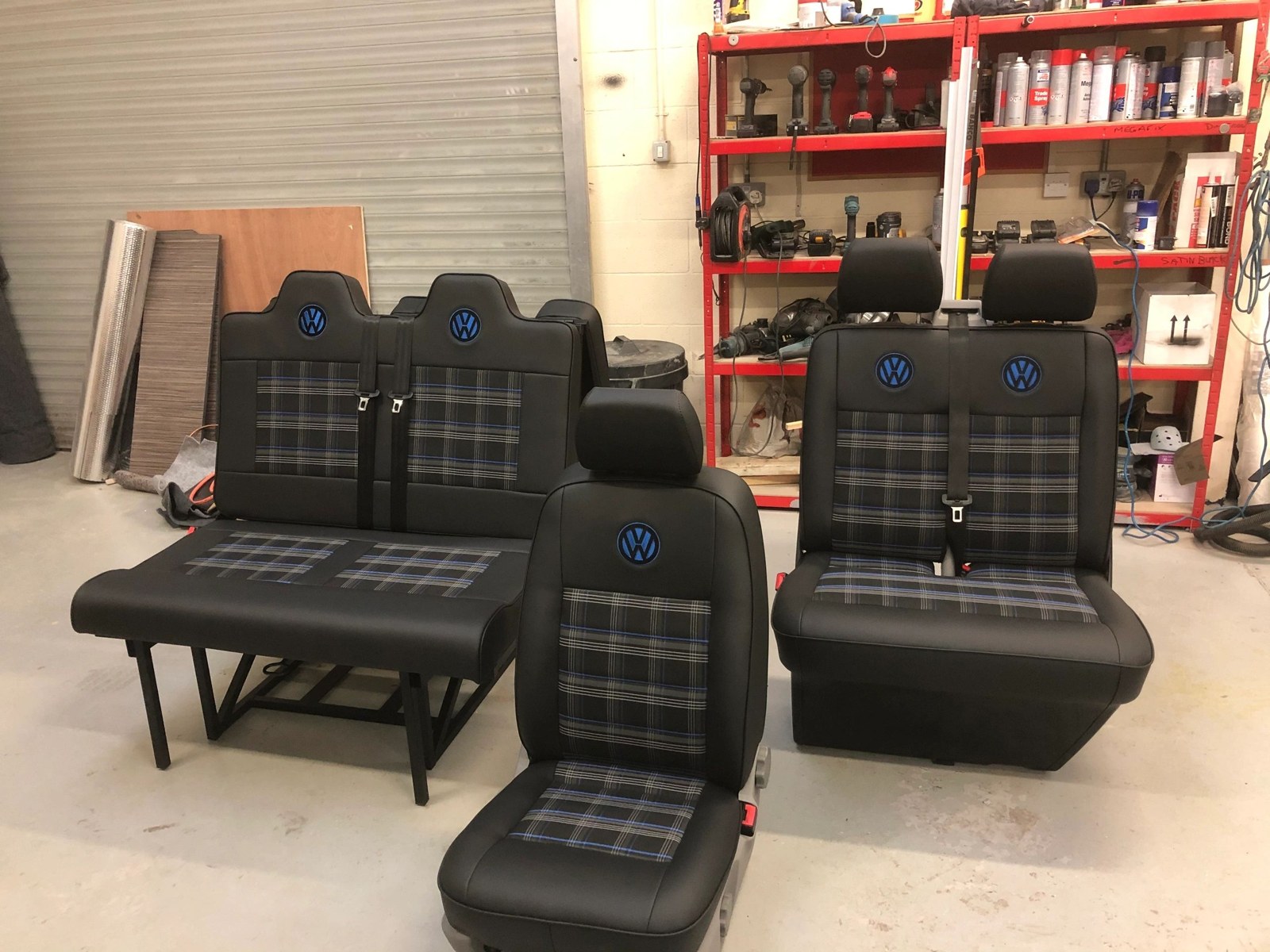 Campervan seats arranged in the workshop